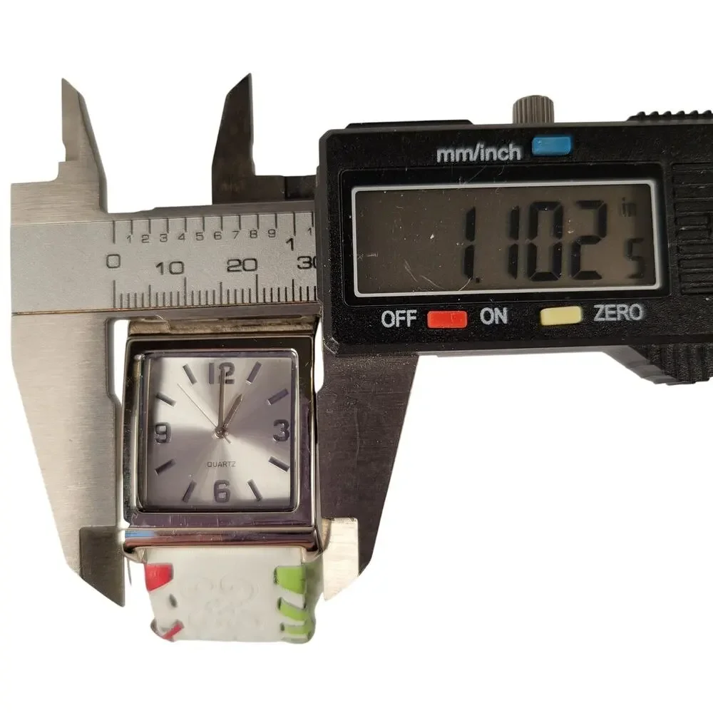 Silver Quartz Watch with Embossed Cuff White Leather Strap and Multicolor Design